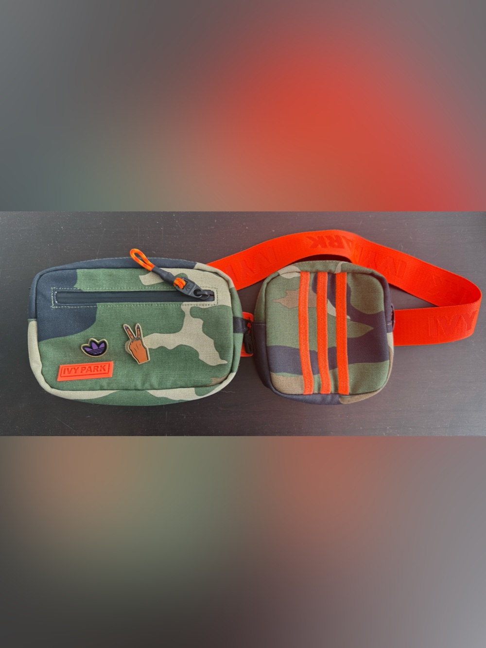 Ivy Park Camo Crossbody Bag with Bright Orange Strap